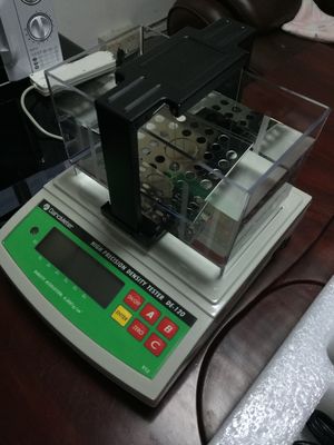 Digital Density Testing Machine with 0.001 g/cm3 Accuracy Based on Archimedes Principle and RS-232C Output