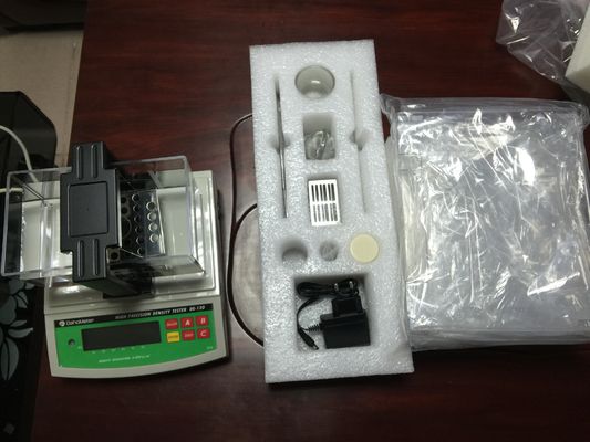 Digital Density Testing Machine with 0.001 g/cm3 Accuracy Based on Archimedes Principle and RS-232C Output